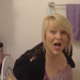A man records his wife as she takes a painful shit. There is no audible pooping sound, but she apparently is going as he starts the recording. She asks him if he wants to see her turd after she poops, but the video ends there. 720P HD video.